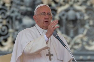 Pope Francis delivers his blessing during his weekly general audience, in St. Peter's Square, at the Vatican, Wednesday, April 15, 2015. (AP Photo/Andrew Medichini)