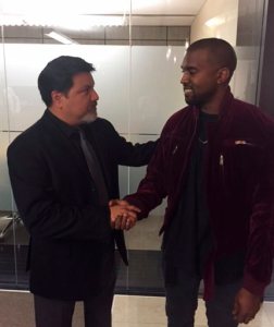 This March 2015 photo provided by courtesy of Allred, Maroko and Goldberg shows videographer Daniel Ramos, left, and Kanye West, shaking hands after West apologized to Ramos as part of a settlement, in Los Angeles. This assault case was set for trial next week on April 14, 2015, but Ramos' lawyer, Gloria Allred, filed for a dismissal on April 7, after a settlement was agreed to by both parties. One important aspect of the settlement was an apology by West to Ramos. (AP Photo/Courtesy Allred, Maroko and Goldberg)