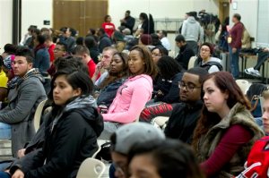 In  this March 24, 2015 photo, University of Maryland students listen to speakers during a town hall meeting about racism in universities and what can be done to stop it, at University of Maryland in College Park, Md. Conversations like the one at Marylands Nyumburu Cultural Center are taking place nationwide as racist incidents continue to pop up at colleges and universities, even though students are becoming increasingly vocal in protesting racism and administrators are taking swift, zero-tolerance action against it. (AP Photo/Jose Luis Magana)