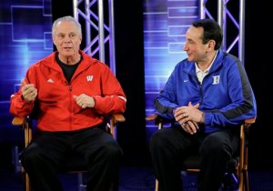 Wisconsin head coach Bo Ryan and Duke head coach Mike Krzyzewski talk during a CBS Sports interview for the NCAA Final Four college basketball tournament championship game Sunday, April 5, 2015, in Indianapolis. (AP Photo/David J. Phillip)
