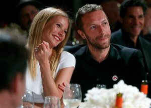 FILE - This Jan. 11, 2014 file photo shows actress Gwyneth Paltrow, left, and her husband, singer Chris Martin at the 3rd Annual Sean Penn & Friends Help Haiti Home Gala in Beverly Hills, Calif. Paltrow filed for divorce on Monday April 20, 2015, in Los Angeles, citing irreconcilable differences and seeks joint physical and legal custody of her  two children with Martin. (Photo by Colin Young-Wolff /Invision/AP, File)