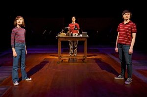 This photo provided by O&M Co shows Sydney Lucas as Small Alison, Beth Malone as Alison, and Emily Skeggs as Medium Alison in "Fun Home" at Circle in the Square Theatre in New York. "Fun Home," with a book and lyrics by Lisa Kron and music by Jeanine Tesori, played for four months at the off-Broadway Public Theater last year. It's been adapted from Alison Bechdel's graphic memoir about growing up in a funeral home with a closeted gay dad. (Joan Marcus via AP)