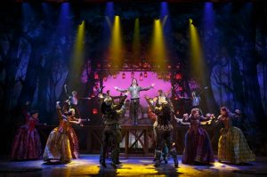 This image released by Boneau/Bryan Brown shows Christian Borle, center, and the cast during a performance of "Something Rotten," in New York. (Joan Marcus/Boneau/Bryan Brown via AP)