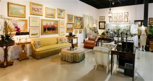 In this April 20, 2015 photo, household items from Oprah Winfrey's Chicago apartment are seen on display in a showroom at Leslie Hindman Auctioneers in Chicago. Furniture, artwork and personal items will be sold at auction on April 25. Included are pieces from Oprah's home gym, designer clothing, shoes and handbags as well as furniture, artwork, china and glassware. Prices range from $50 to $120,000. Proceeds will benefit the Oprah Winfrey Leadership Academy Foundation. (AP Photo/Teresa Crawford)