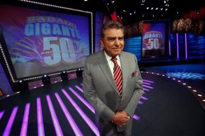 FILE- In this photo taken on Feb. 3, 2012, Chilean born host of the Univision network variety show "Sabado Gigante," Mario Kreutzberger, popularly known as Don Francisco, poses on the set of his show in Miami. Univision announced Friday, April 17, 2017 that the the beloved  show Sábado Gigante will end on Sept. 19, 2015 after 53 years on the air. (AP Photo/Wilfredo Lee, File)