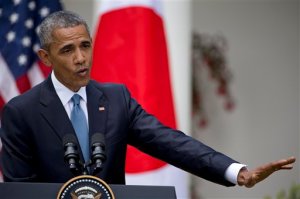 President Barack Obama speaks about recent unrest in Baltimore during his joint news conference with Japanese Prime Minister Shinzo Abe, Tuesday, April 28, 2015, in the Rose Garden of the White House in Washington. (AP Photo/Jacquelyn Martin)