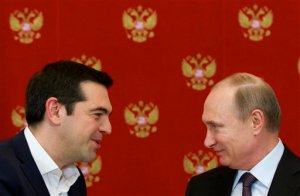 Russian President Vladimir Putin, right, and Greek Prime Minister Alexis Tsipras speak during a signing ceremony in the Kremlin in Moscow, Russia, Wednesday, April 8, 2015. Russian President Vladimir Putin said the leader of Greece did not ask for financial aid during an official visit, easing speculation that Athens might use its relations with Moscow to gain advantage in bailout talks with European creditors. (AP Photo/Alexander Zemlianichenko, Pool)