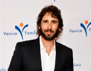 FILE - In this March 9, 2015, file photo, singer Josh Groban attends the 2015 Silver Circle Gala in Beverly Hills, Calif. Groban has been selected to sing the national anthem at the annual Kentucky Derby, to be held May 2, 2015, at the Churchill Downs racetrack in Louisville, Ky. (Photo by Chris Pizzello/Invision/AP, File)