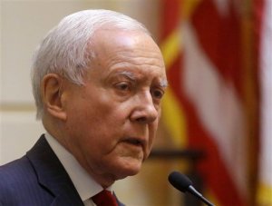 FILE - In this Feb. 19, 2015 file photo, Senate Finance Committee Chairman Sen. Orrin Hatch, R-Utah speaks in Salt Lake City. Top lawmakers struck a bipartisan agreement on Thursday to allow President Barack Obama to negotiate trade deals subject to a yes-or-no vote from Congress without the possibility of changes. The "fast-track" legislation comes as Obama seeks a sweeping trade deal with 11 Pacific nations. The Trans-Pacific Partnership proposes a trade agreement involving the United States, Japan, Vietnam, Canada, Mexico and seven other Pacific-rim nations. (AP Photo/Rick Bowmer, File)
