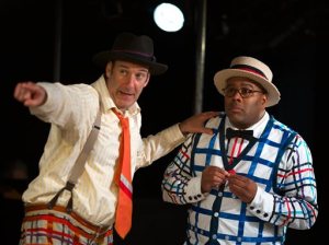 In this undated photo provided by Graham Dougherty, Max Crumm, left, and Dan Sharkey perform in the off-Broadway production of "The Fantasticks." The off-Broadway phenomenon "The Fantasticks" wont be closing in May after all, thanks to a pair of fantastic fans. Producer Catherine Russell said Saturday, April 25, 2015, that two donors have stepped up and pledged to keep the stalwart, low-tech show open. Plans had been made for the show to close after some 20,000 performances on May 3, the 55th anniversary of the show's opening in 1960. (Graham Dougherty via AP)