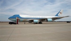 Air Force One awaits President Barack Obama on the tarmac at Andrews Air Force Base, Md., Thursday, April 2, 2015, for his trip to Louisville, Ky. The president delayed his departure for the trip because of the Iran nuclear talks in Switzerland, and to speak in the Rose Garden. But he's going ahead with the visit. (AP Photo/Manuel Balce Ceneta)