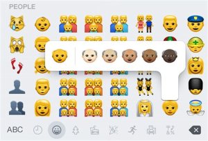 This screen shot made Thursday, April 9, 2015 on an iPhone 6 shows some of the new emojis available with the iOS 8.3 software update. The batch of more than 300 new emojis includes ones different skin tones and depictions of families with two moms or two dads. (AP Photo)