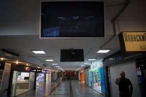 In this photo taken on Friday, Feb. 13, 2015, a seller speaks on his mobile in a hall of a mall trading in electronics and home appliances in Moscow, Russia. The first economic sanctions were implemented in March last year. In the summer and early fall, the U.S. and EU broadened sanctions to effectively cut off some of Russias largest state and private companies from the international financial system and stopping Western firms from making any new deals. (AP Photo/Pavel Golovkin)