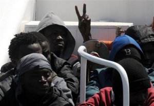 Migrants arrive at Palermo's harbor, Italy, after being rescued at sea, Wednesday, April 15, 2015. The U.N. refugee agency says the shipwreck in the Mediterranean this week, in which 400 migrants are presumed to have died, is among the deadliest single incidents in the last decade. The tragedy comes amid an unprecedented wave of migration toward Europe from Africa and the Middle East. UNHCR Italy spokeswoman Barbara Molinario says 900 migrants have died or gone missing at sea so far this year, part of a phenomenon the agency has been tracking since 2011. (AP Photo/Alessandro Fucarini)
