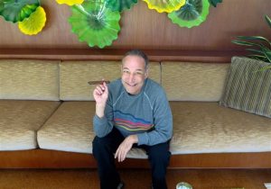 This Aug. 12, 2013 file photo shows Sam Simon, co-creator of "The Simpsons," at his home in Pacific Palisades, Calif. Authorities are asking the public's help in finding two paintings one of them by famed American Roy Lichtenstein that were stolen from a Malibu foundation established by Simon, the late co-creator of "The Simpsons." They were reported stolen Friday April 10, 2015 from the Sam Simon Foundation. Simon was 59 when he died in March from cancer.