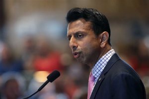 Louisiana Gov. Bobby Jindal addresses the opening session of the Louisiana State Legislature in Baton Rouge, La., Monday, April 13, 2015. (AP Photo/Gerald Herbert, Pool)
