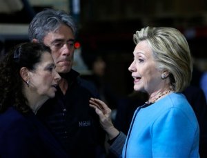 Democratic presidential candidate Hillary Rodham Clinton meets with employees at Whitney Brothers during a campaign stop, Monday, April 20, 2015, in Keene, N.H. (AP Photo/Jim Cole)