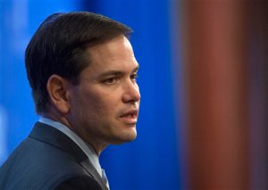 FILE - In this April 15, 2015 file photo, Republican presidential candidate Sen. Marco Rubio, R-Fla. speaks in Washington. Hes offering himself as a new generation of leader, but Marco Rubio is still respecting an old presidential campaign tradition: courting caucus goers in the kickoff caucus state of Iowa. The Florida senator will be in Iowa this weekend on his first trip to the state since he announced his 2016 Republican presidential candidacy. Rubios appearance at a candidate forum in suburban Des Moines on Saturday will be an introduction for many voters, who have not seen Rubio as much as many of his competitors this year. (AP Photo/Molly Riley, File)