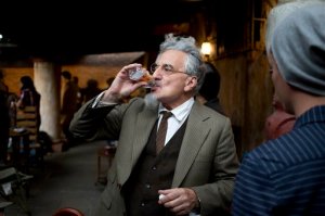 In this April 22, 2015 photo, British stage veteran Henry Goodman, who plays the part of Leon Trotsky, sips water before a press conference on the set of the film "El Elegido," or "The Chosen," in Mexico City. The plot to assassinate Leon Trotsky, the Soviet revolutionary-turned-exiled dissident, in Mexico City in 1940, is at the heart of "El Elegido" ("The Chosen"), an upcoming movie that's set to wrap shooting in this capital in the coming days. (AP Photo/Eduardo Verdugo)