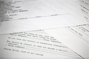 A translated copy of an application to join Osama bin Laden's terrorist network is photographed in Washington, Wednesday, May 20, 2015. The document is among 100 realized by U.S. intelligence officials. U.S. intelligence officials have released more than 100 documents seized in the raid on Osama bin Ladens compound, including a loving letter to his wife and a job application for his terrorist network. The Office of the Director of National Intelligence says the papers were taken in the Navy SEALs raid that killed bin Laden in Pakistan in 2011.(AP Photo)