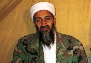 FILE - This undated file photo shows al Qaida leader Osama bin Laden in Afghanistan. U.S. intelligence officials have released more than 100 documents seized in the raid on Osama bin Ladens compound, including a loving letter to his wife and a job application for his terrorist network. The Office of the Director of National Intelligence says the papers were taken in the Navy SEALs raid that killed bin Laden in Pakistan in 2011. (AP Photo, File)