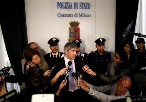 Milan chief anti-terrorism investigator Bruno Megale, center, speaks during a press conference in Milan, Italy, Wednesday, May 20, 2015. Police say Abdelmajid Touil, the Moroccan man arrested in connection with the Tunisian museum attack, had arrived in Italy aboard a migrant boat a month before the attack and was ordered expelled. (Mourad Balti Touati/ANSA via AP)