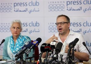 Reporters Without Borders secretary general Christophe Deloire, right, and Deborah Tice, mother of Austin Tice who is missing in Syria,  speak during a joint press conference, at the Press Club, in Beirut, Lebanon, Tuesday, May 19, 2015. Journalist Austin Tice, of Houston, Texas, disappeared in August 2012 while covering Syria's civil war. It's not clear what entity is holding him, but it is not believed to be the Islamic State group or the Syrian government, his family has said. (AP Photo/Bilal Hussein)