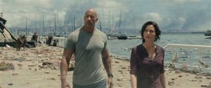 This photo provided by Warner Bros. Pictures shows Dwayne Johnson, left, as Ray, and Carla Gugino as Emma, in a scene from the action thriller, "San Andreas." The movie releases in theaters on May 29, 2015.  (Courtesy Warner Bros. Pictures via AP)
