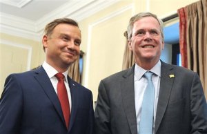 Former US Governor of Florida Jeb Bush, right, meets Polish President-elect Andrzej Duda in Warsaw, Poland, Thursday, June 11, 2015. (AP Photo/Alik Keplicz)