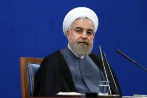 Iran's President Hassan Rouhani gives a press conference on the second anniversary of his election, in Tehran, Iran, Saturday, June 13, 2015. Rouhani said a final nuclear deal is "within reach" as Iran and world powers face a June 30 deadline for an agreement. Rouhani said Iran will allow inspections of its nuclear facilities but vowed that the Islamic republic won't allow its state "secrets" to be jeopardized under the cover of international inspections. (AP Photo/Ebrahim Noroozi)