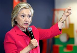 FILE - In this June 15, 2015, file photo, Democratic presidential candidate Hillary Rodham Clinton speaks to a group at the YMCA during a campaign stop in Rochester, N.H. Eight years ago, Clinton arrived in New Hampshire as a presidential candidate with something to prove. This time around, as she mounts her second run for the White House, Clintons gender isnt something she seeks to explain or defend. Rather, her potential to make history as the nations first female president has become one of her biggest applause lines. (AP Photo/Jim Cole, File)