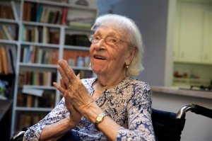In this Friday, May 29, 2015 photo, artist Carmen Herrera is interviewed in her New York studio. Herrera, who turned 100 on Sunday, May 31, says she's still bursting with ideas she wants to put on canvas. (AP Photo/Richard Drew)