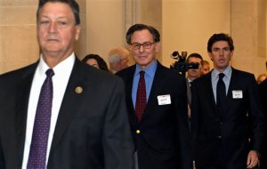 Sidney Blumenthal, a longtime confidant to former President Bill Clinton and Democratic presidential candidate Hillary Rodham Clinton, center, arrives on Capitol Hill in Washington, Tuesday, June 16, 2015, to face questions from the Republican-led House panel investigating the deadly 2012 attacks in Benghazi, Libya. (AP Photo/Susan Walsh)