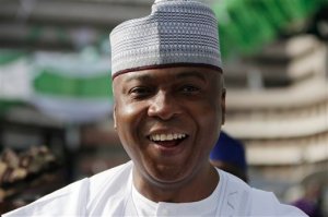 In this Photo taken Friday, May 29, 2015, Bukola Saraki, attends the Inauguration of the Nigerian President in Abuja, Nigeria.  The former governor has been elected head of Nigeria's Senate Tuesday, June 9, 2015, becoming the third most powerful person in the country by challenging the wishes of the presidential coalition to which he belongs. Bukola Saraki's victory highlights the cracks appearing in the coalition that brought President Muhammadu Buhari to power. (AP Photo/Sunday Alamba)