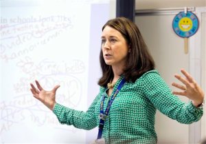 Carrie Gantt gives instructions to her students before the beginning of a group project in her Teachers for Tomorrow class on Wednesday, May 27, 2015 at Princess Anne High School in Virginia Beach, Va. A recent study shows that fewer students want to become teachers. To combat this decline, Virginia Beach offers a state program, Teachers for Tomorrow. (The' N. Pham/The Virginian-Pilot via AP)