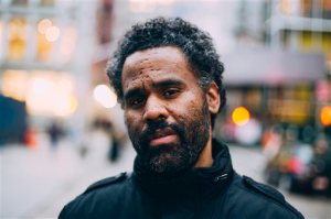 This image released by CNN Films shows Sacha Jenkins, director of "Fresh Dressed," a new documentary that explores the roots of hip-hop fashion, from southern plantation culture and the rise of Little Richard to the gang warfare of the burned-out, 1970s South Bronx and knockoff king Dapper Dan in Harlem. (CNN Films via AP)