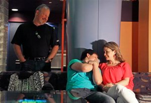 Don Stringer, left, and his wife, Marsha, laugh with their son, Gatlin, 14, center, while visiting at Houston's M.D. Anderson Cancer Center on Friday, May 22, 2015. Gatlin and his brother Garrett were both successfully treated for acute lymphocytic leukemia when they were very young. Now, they are "amazing ... no side effects at all that we know of," Marsha says. "They're very athletic and active and have good grades." (AP Photo/Pat Sullivan)