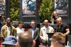 Vin Diesel, right, speaks at the World Premiere of the "Fast & Furious-Supercharged" ride at Universal Studios Hollywood on Tuesday, June 23, 2015, in Universal City, Calif. (Photo by John Salangsang/Invision/AP)