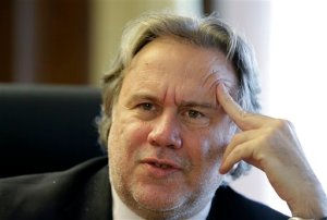 Greek Deputy Minister of Interior and Administrative Reconstruction Giorgos Katrougalos speaks during an interview with the Associated Press in Athens on Tuesday, June 2, 2015. Katrougalos said he expects Greece to reach an agreement by the end of the week and that the country intends to honor all its debt obligations. (AP Photo/Thanassis Stavrakis)