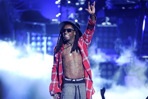 Atlanta man surrenders in shooting of Lil Wayne’s tour bus 