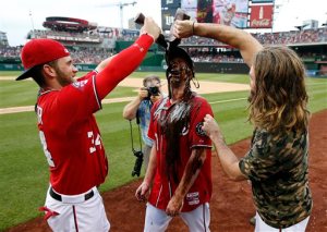 Washington Nationals' Bryce Harper, left, and Jayson Werth, right, douse starting pitcher Max Scherzer with chocolate syrup after Scherzer's no-hitter baseball game against the Pittsburgh Pirates at Nationals Park, Saturday, June 20, 2015, in Washington. The Nationals won 6-0. (AP Photo/Alex Brandon)