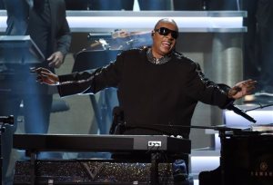 FILE - In this Feb. 10, 2015, file photo, Stevie Wonder takes in applause from the audience during the finale of "Stevie Wonder: Songs in the Key of Life - An All-Star Grammy Salute," at the Nokia Theatre L.A. Live, in Los Angeles. Organizers of the Special Olympics World Games announced Thursday, June 18, 2015, that Wonder, Cody Simpson, Avril Lavigne and several other stars will perform during the games opening ceremonies in Los Angeles on Saturday, July 25. The event, held every four years, will feature 7,000 athletes and tens of thousands of spectators from around the world. (Photo by Chris Pizzello/Invision/AP, File)