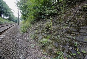 The potencial site where a Nazi gold train is believed to be hidden, near the city of Walbrzych, Poland, Friday, Aug. 28, 2015. Poland's Deputy Culture Minister Piotr Zuchowski said Friday he has seen an image made by ground-penetrating radar that seemed to prove the discovery of an armored Nazi train missing in southwestern Poland since World War II, and is more than 99 percent certain that this train exists.. (AP Photo/Str)--POLAND OUT