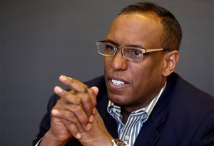 FILE - In this May 6, 2015, file photo, NCAA chief legal officer Donald Remy speaks during an interview in Indianapolis. The National Labor Relations Board has dismissed a historic ruling that Northwestern University football players are school employees who are entitled to form what would be the nation's first union of college athletes. The NLRB released its decision Monday, Aug. 17, 2015. The losing side does not have an option to appeal.(AP Photo/Michael Conroy, File)