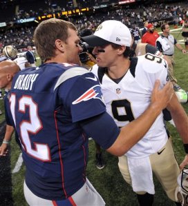 New England Patriots quarterback Tom Brady (12) greets New Orleans Saints quarterback Drew Brees (9) after an NFL preseason football game in New Orleans, Saturday, Aug. 22, 2015. The Patriots won 26-24. (AP Photo/Bill Feig)