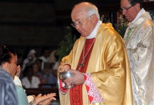 FILE - In this March 15, 2013, Archbishop Josef Wesolowski, former ambassador to the Dominican Republic, leads a Mass in Santo Domingo, Dominican Republic. The Vatican says Friday, Aug. 28, 2015 its former ambassador to the Dominican Republic, who has been charged by church prosecutors with sexually abusing children in the Caribbean country, was found dead in his Vatican room early Friday: the Vatican prosecutor ordered an immediate autopsy. (AP Photo/Manuel Diaz, File)