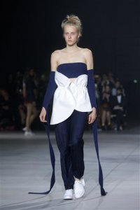 A model wears a creation by French designer Simon Porte for Jacquemus, as part of his Spring-Summer 2016 ready-to-wear fashion collection, in Paris, Tuesday, Sept. 29, 2015. (AP Photo/Thibault Camus)