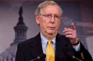 In this photo taken Aug. 6, 2015, Senate Majority Leader Mitch McConnell speaks during a news conference on Capitol Hill in Washington. The Senate is on track to advance legislation to prevent the government from shutting down after a midnight Wednesday deadline. But a move by McConnell to strip the measure of language to take away federal funding from Planned Parenthood has rankled conservatives such as Ted Cruz, R-Texas, and tea partyers in the House.  (AP Photo/Jacquelyn Martin)