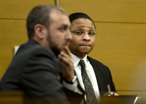 FILE - In this Aug. 12, 2015, file photo, Dexter Lewis sits during the penalty phase of his murder trial, in Denver. Lewis, convicted of stabbing five people to death during a Denver bar robbery that netted $170 will be formally sentenced to life in prison on Wednesday, Sept. 30. (AAron Ontiveroz/The Denver Post via AP, File) MAGS OUT; TV OUT; INTERNET OUT; NO SALES; NEW YORK POST OUT; NEW YORK DAILY NEWS OUT; MANDATORY CREDIT