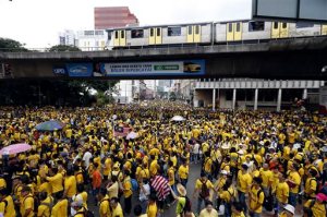 Protesters march at a rally organized by pro-democracy group "Bersih" (Clean) in Kuala Lumpur, Malaysia, Saturday, Aug. 29, 2015. Malaysian activists are putting more pressure on embattled Prime Minister Najib Razak to resign with major street rallies this weekend following allegations of suspicious money transfers into his accounts. (AP Photo/Lai Seng Sin)